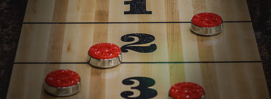 Close up image of a shuffleboard table